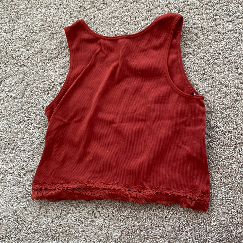 Maroon tank top with lace at the bottom